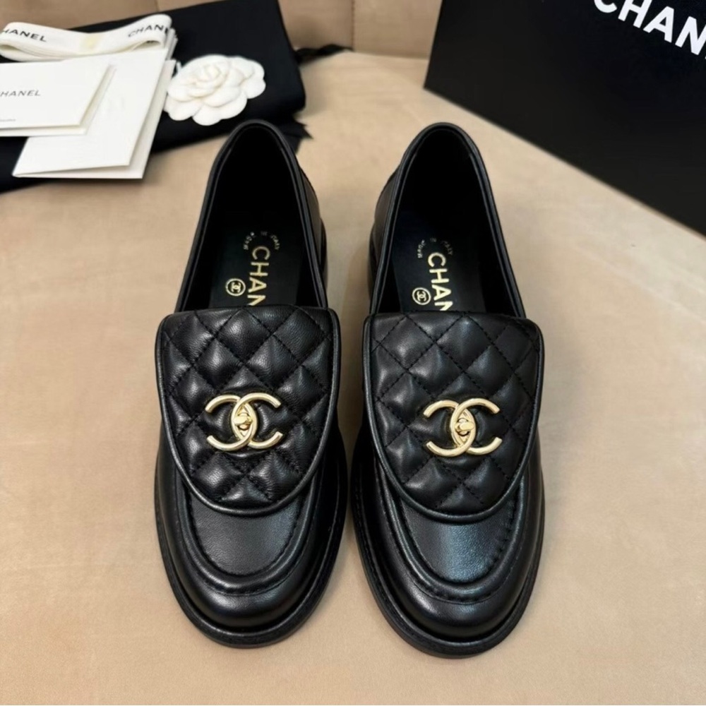 CHANEL Black Quilted Leather Loafers with Gold CC Medallion